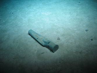 Compressed 4-inch shell casing